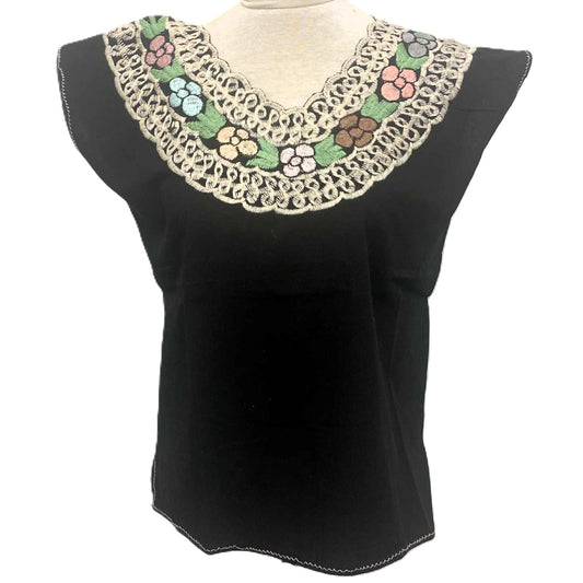 Black sleeveless top with colorful floral embroidery on a mannequin against a white background