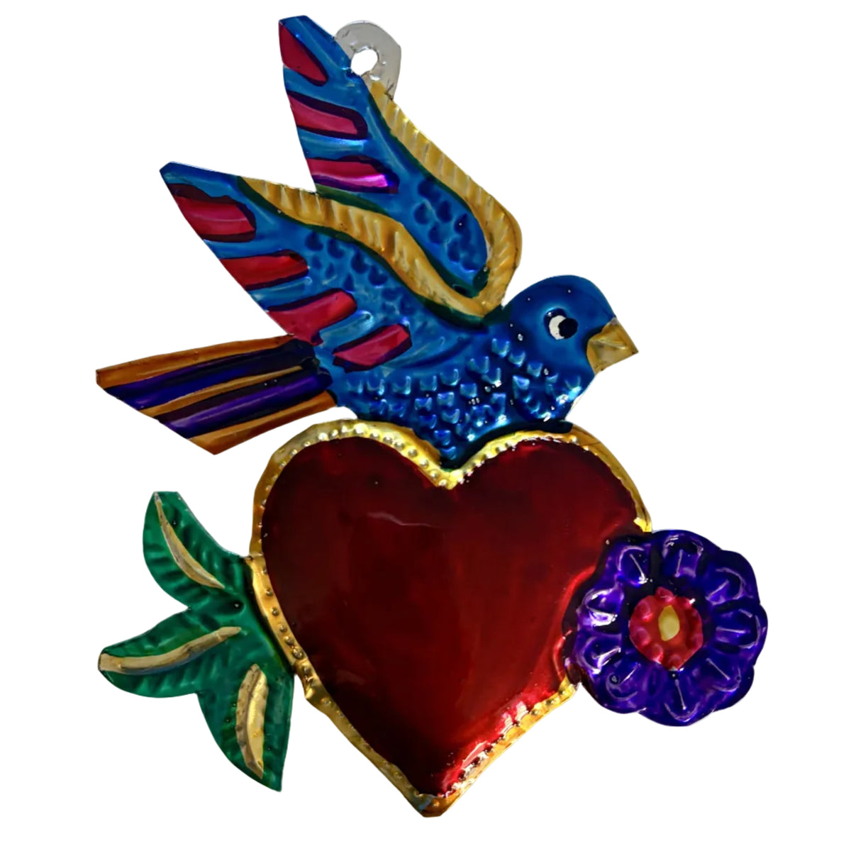 A colorful metal ornament featuring a blue bird with red and gold wings, perched on a large red heart with green leaves and a purple flower, set against a plain white background.