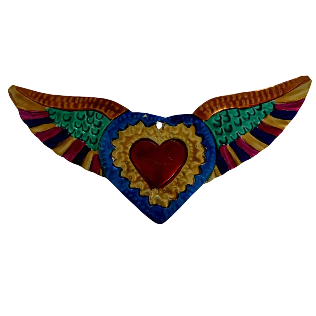 A colorful decorative metal wall hanging shaped like a heart with wings. The center features a red heart, surrounded by gold, blue, and green details, with striped wings in orange, yellow, green, pink, and purple, all photographed against a plain off-white background.