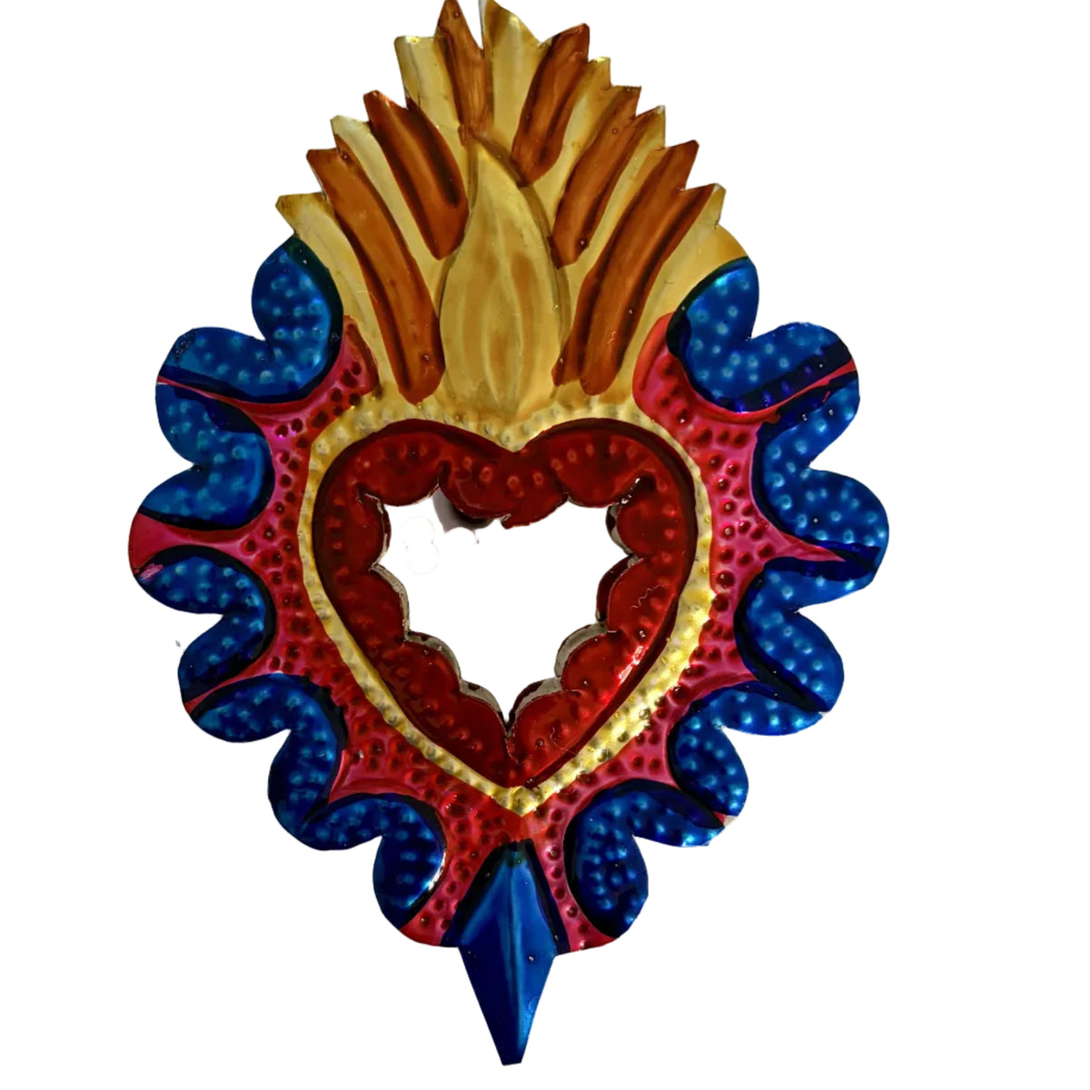 A colorful decorative wall plaque featuring a stylized Sacred Heart design with a red heart, gold rays, and blue scalloped borders on a plain off-white background.