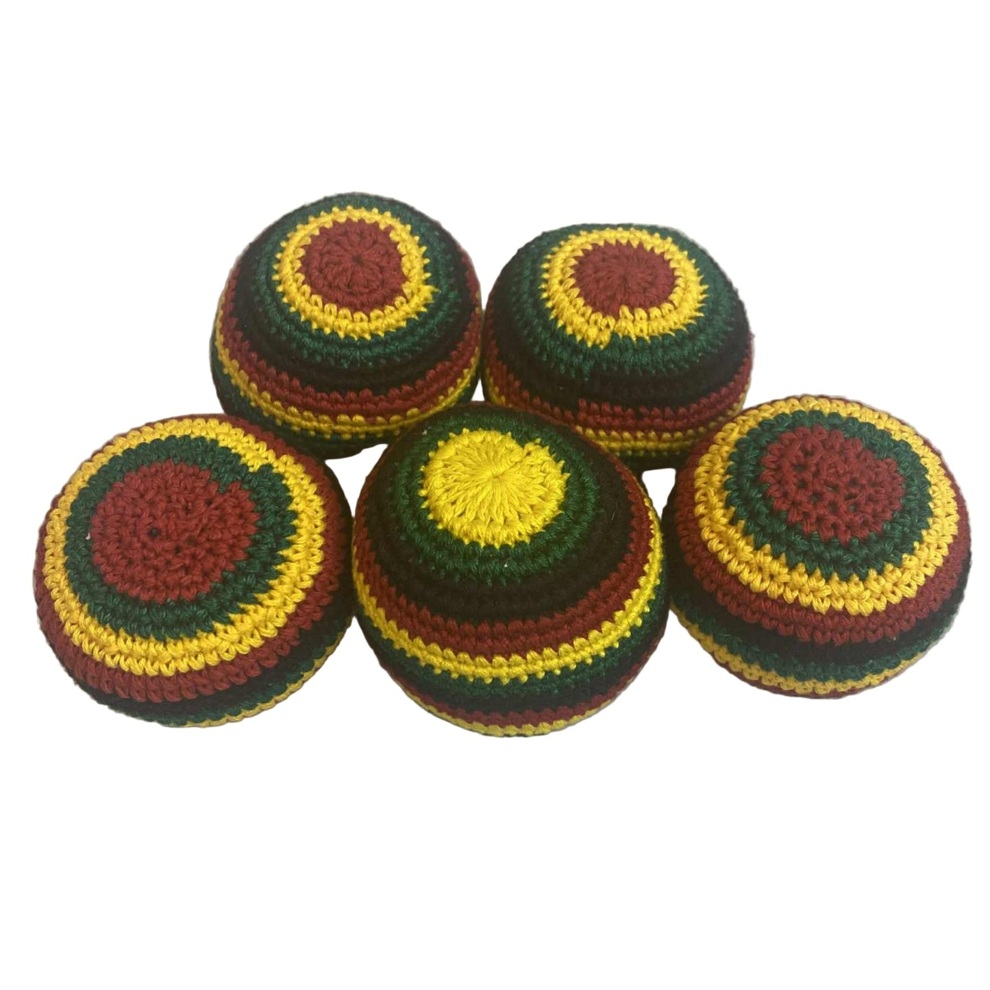 Five crocheted balls with a rasta pattern on a light gray background